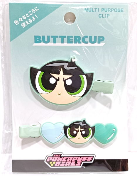 Front view of The Powerpuff Girls Buttercup multi-purpose clip set in its packaging, featuring a light green card with a large Buttercup face clip and a matching heart-shaped accessory clip below.