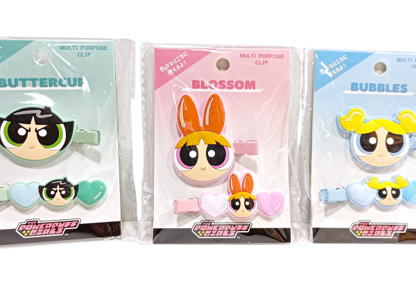 The Powerpuff Girls multi-purpose hair clip sets displaying all three characters, including Buttercup on a green card, Blossom on a pink card, and Bubbles on a blue card, each containing a character face clip and a heart hair accessory.