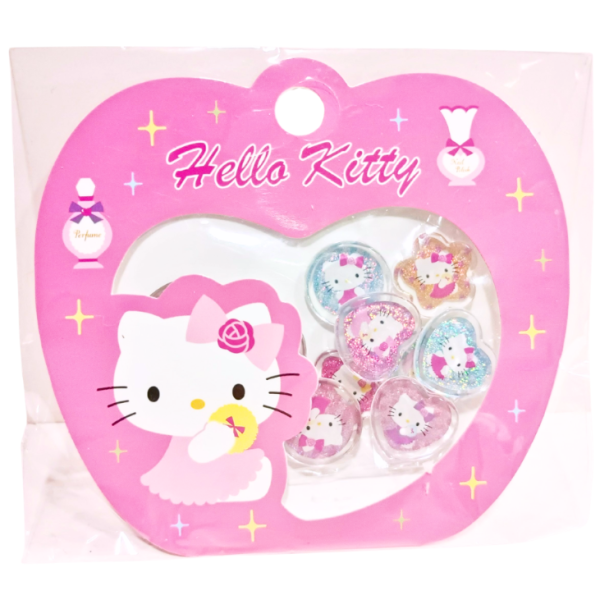 Front view of vintage Sanrio Hello Kitty acrylic decoration sticker pack in its original packaging, featuring various glittery acrylic stickers on a dark pink apple-shaped card.